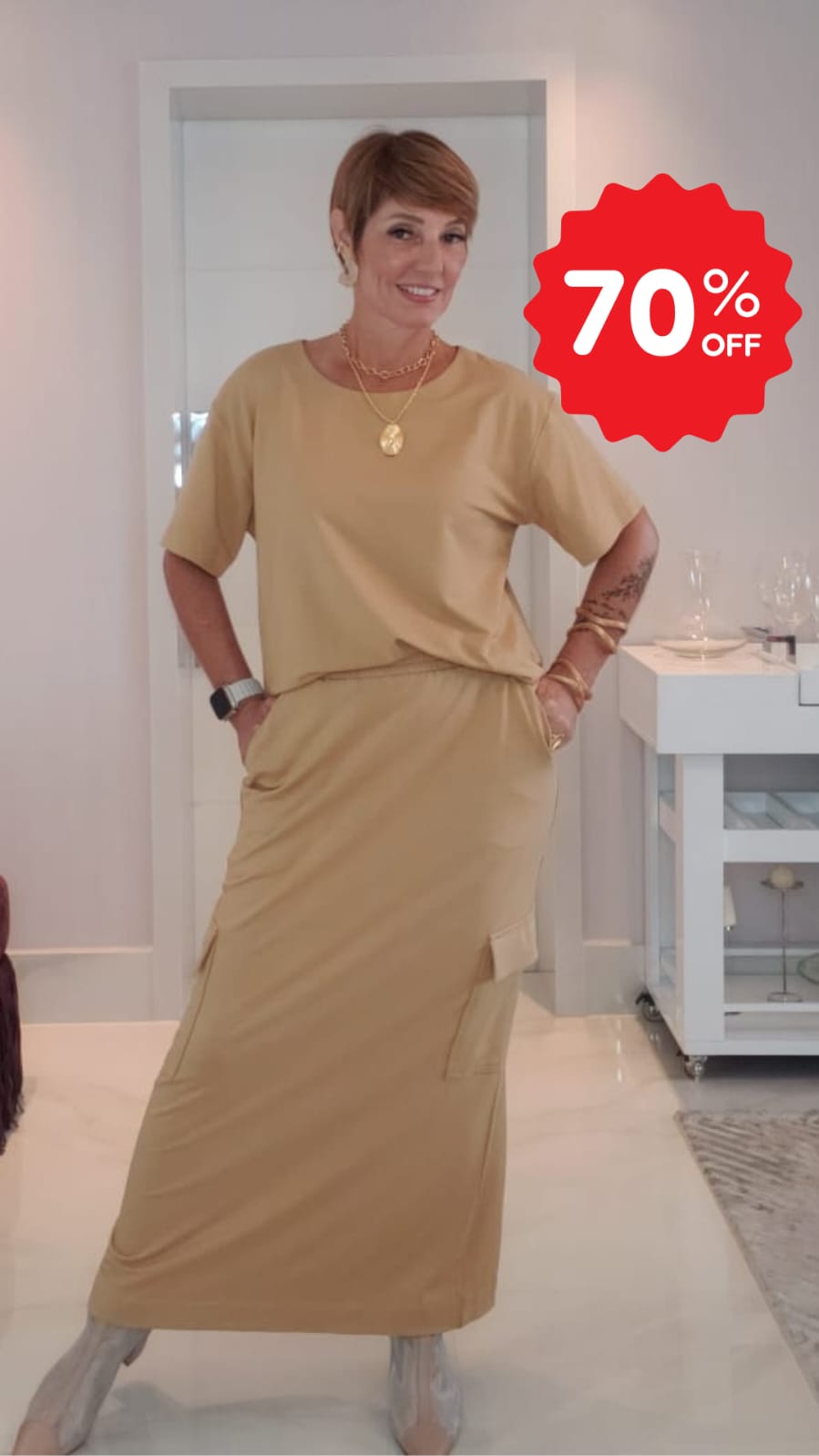 SAIA DE MALHA MIDI COM BOLSOS NAS LATERAIS E ELASTICO CINTURA